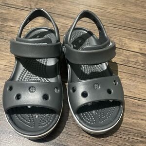 Croc sandals dark gray. Preowned toddler size 9